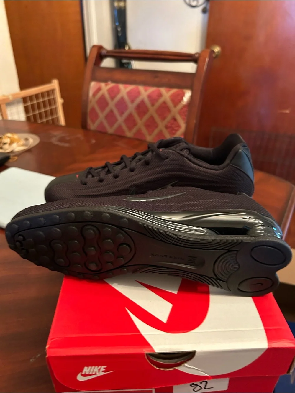 Nike Women’s Black Athletic Shoes with Red Accents